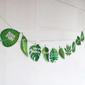 Green tropical leaf party banner featuring turtle leaves and Have Fun printed slogans - Green Tropical Leaves Banner