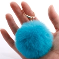 Bright blue faux rabbit fur pompom keychain with a polished golden metal ring - 7cm Pom-pom / Lake Blue