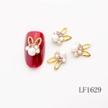 3D bunny nail art charm with gold frame, central pearl and pink rhinestones LF1629 - Gold Rabbit Ear White Zircon Pearl Style (LF1629)