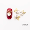 Golden alloy rabbit nail jewelry with pearls and pink rhinestones set on dark red nails - Gold Rabbit Ear Pink Zircon Pearl Style (LF1628)