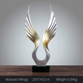 Abstract wings art sculpture in silver and gold finish on a black base, 42cm height - Silver Gold Abstract Wings Ornament