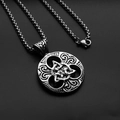 Detail of silver Celtic knot pendant with heart cutouts and stainless steel box chain - Celtic Knot Tag + Stainless Steel Chain