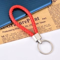 Portachiavi in pelle intrecciata rossa con anello in metallo argento per auto e borse - Rosso
