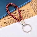 Portachiavi in pelle intrecciata rossa e nera con anello in metallo lucido argento - Patchwork Rosso Nero