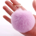 Pink purple faux rabbit fur pom pom keychain with a glossy golden metal ring - 7cm Pom-pom / Violet
