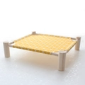 Elevated pet hammock with yellow geometric pattern and sturdy solid wood frame support - Yellow Check