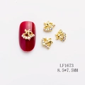 Bijou d'ongle étoile en alliage doré avec strass AB, taille 8,5x7,5 mm, modèle LF1673 - Étoile Croisée Dorée Strass AB (LF1673) / 8.5*7.5MM