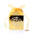 Detail of laser-cut double happiness candy box in gold finish with matching ribbon - Reflective Gold