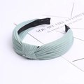 Knitted cotton wide knot headband in light mint green with pleated fabric texture - Fruit Green
