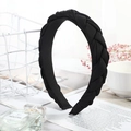 Black braided twist headband in thick matte fabric with a minimalist vintage design - Black