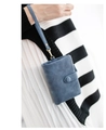 Detail of blue matte suede wristlet wallet for women featuring a snap closure and strap - Royal Blue p-04