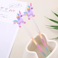 Two unicorn gel pens with rainbow silicone toppers and colorful glitter liquid barrels - Purple Pony