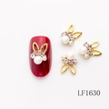 Cute bunny nail charms with gold alloy, white pearls and pink rhinestones on red nails - Gold Rabbit Ear Purple Zircon Pearl Style (LF1630)