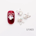 Silver bunny nail charm with large central pearl and iridescent rhinestones on red nail - Silver Rabbit Ear AB Zircon Pearl Style (LF1621)