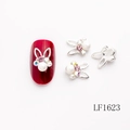 Silver bunny nail charm with white pearls and pink rhinestones on red nails - Silver Rabbit Ear White Zircon Pearl Style (LF1623)