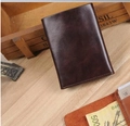 Dark brown high-quality PU leather wallet for men in a vintage business lifestyle setting - Tri-fold Wallet / Coffee