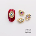 Abalorio de corazón dorado para uñas con cristal irisado en tamaño 9x11mm - Estilo Marquesa AB (1729)