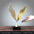 Modern gold and silver wing sculpture on black base, dimensions 23.5x6x32cm - Gold and Silver Gradient Wings