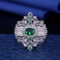 Vintage royal style silver ring with large oval green gemstone and hollow metalwork - US 6 / Green