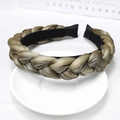 Macro shot of olive green braided satin headband with metallic sheen on white ceramic tray - Army Green