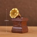 Miniature vintage resin phonograph model in brown and gold finish, height 2.8cm - Gramophone