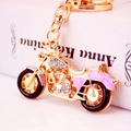 Gold motorcycle keychain with sparkling rhinestones and pink enamel details on a ring - Purple Motorcycle