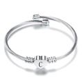 Minimalist silver stainless steel twisted cuff bracelet featuring heart-shaped charm with letter C - Letter C / Steel