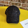 Detailed view of the sparkling black rhinestones and texture on the baseball cap - Adjustable / Black
