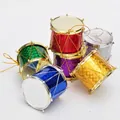 Dettaglio di tamburi natalizi colorati e luccicanti per decorare l'albero - Tamburi Piccoli Stile B 3,5cm (Confezione da 6)