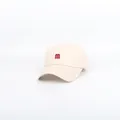 Close-up of red M letter embroidery on beige cotton baseball cap with curved brim - M (56-58cm) / Beige
