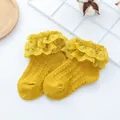 Detailed close-up of yellow baby princess socks with double-layered lace ruffles - Yellow / 9-12cm(6-12 Months)