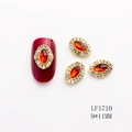 Vista detallada de joyas para uñas 9x11mm con piedra marquesa roja y base dorada - Estilo Marquesa Rojo (1710)