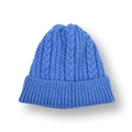 Close-up of blue cable knit beanie showing thick texture and wide ribbed cuff detail - Sapphire Blue