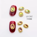 7x9mm oval nail art rhinestones with gold rope borders in red and yellow gradients - Gold Base Colorful Rhinestone Small (1767)
