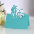 Detail of laser-cut Mr & Mrs wedding place card with heart and ring motifs in tiffany blue - Turquoise Blue