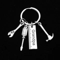 Detail of metal keychain with hammer, wrench, screwdriver and Grandpa engraved ruler charm - Type C Grandpa