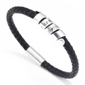 Bracciale da uomo in pelle nera intrecciata con ciondoli e chiusura magnetica - Nero
