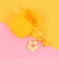 Yellow silicone AirPods case with floral bell keychain accessory on a dual-tone background - Hyuna Style Flower Bell / Yellow (Q099-03) Pendant Only (Without Earphone Case)
