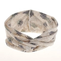 Detail of bohemian twisted headband featuring green palm leaf print on creamy white fabric - Beige Leaves