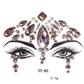 Close-up of amber champagne acrylic face gems in teardrop and oval shapes for forehead - YT-65 (Amber Rhinestone)