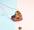 Detail of heart-shaped sequin crossbody bag for kids with reversible flip sequins - Gold + Light Pink