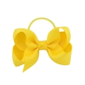 Detail of yellow grosgrain ribbon bow hair tie with elastic band on white background - Yellow