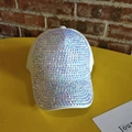 White baseball cap with colorful iridescent rhinestones on a rustic brick background - Adjustable / Clear Multicolor