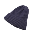 Detailed close-up of dark blue ribbed knit texture on a minimalist baby beanie - One Size / Navy Blue