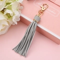 Elegant grey faux leather tassel keychain with gold lobster clasp for handbags - Gray