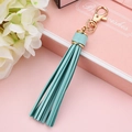 Light blue PU leather tassel keychain with gold lobster clasp on pink gift box - Light Blue