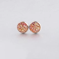 Close-up of 10mm orange drusy stud earrings with glittery resin and silver metal base - Orange Crystal (10)
