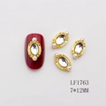 Oval nail charm with gold frame, clear zircon and small white pearls on red nail - Gold Base White Rhinestone (1763)