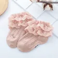 Detail of baby girl pink cotton socks with three-layer lace edges and breathable mesh knit - Dusty Pink