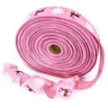 Detalle de la cinta navideña de yute rosa con renos marrones y copos de nieve blancos - 2 Metros / Rosa